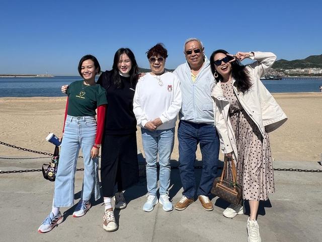 78歲的中國跳水教練周希洋，與她的馬來西亞弟子們